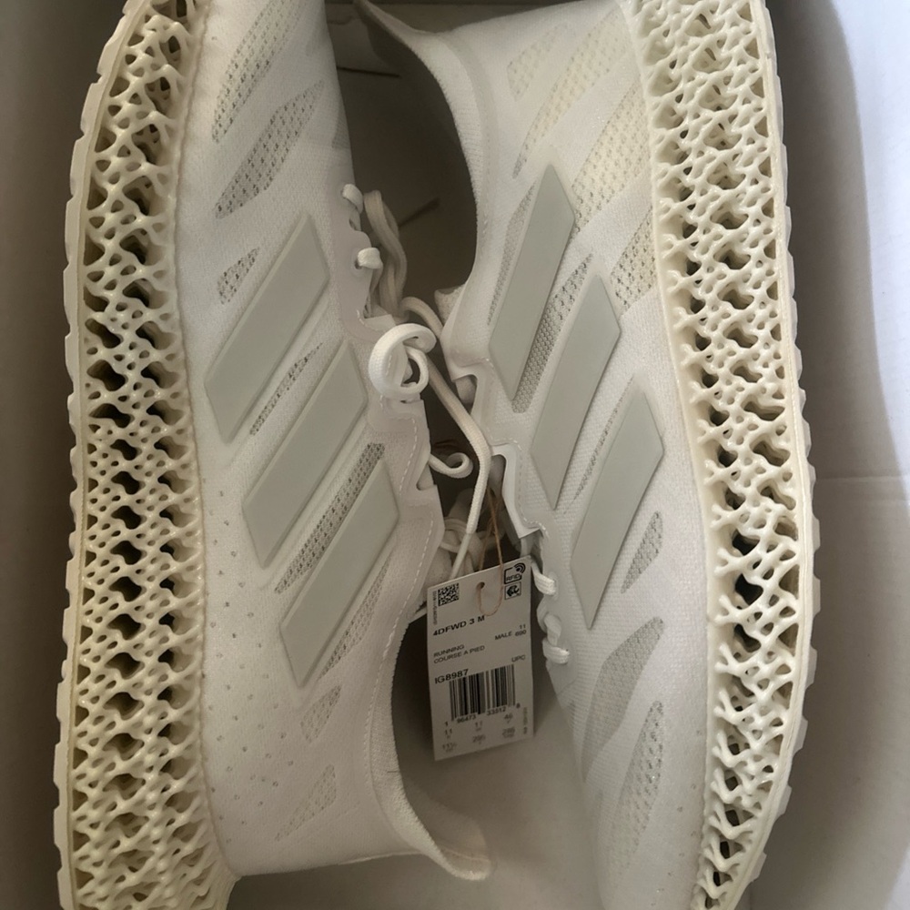 Adidas 4DFWD 3M running shoes.